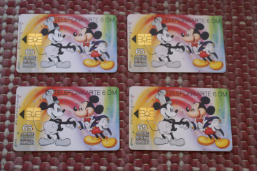 Telefonkartenkleinserie: 4 Telefonkarten (Walt Disney) mit Airbrushmotiven (Mickey im Laufe der Zeit) zum 65. Jubiläum von Micky Maus 
